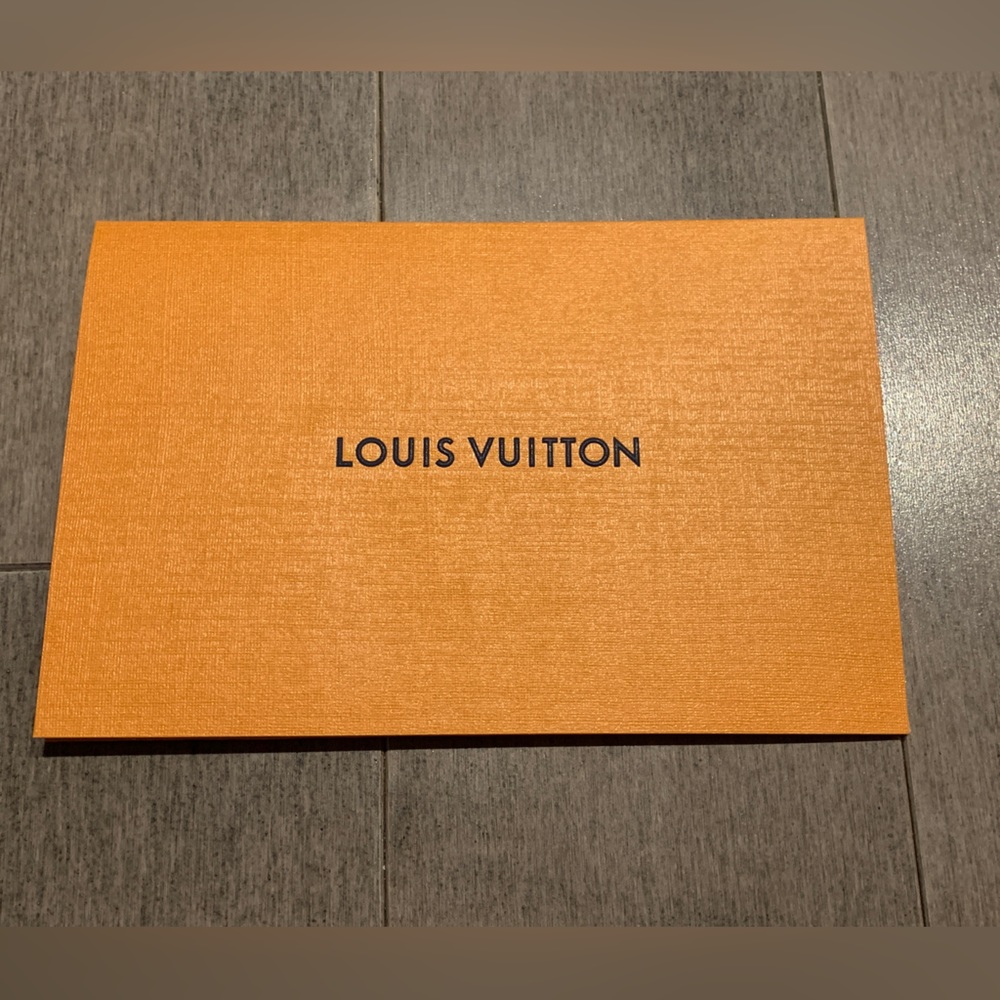 Louis Vuitton receipt holder